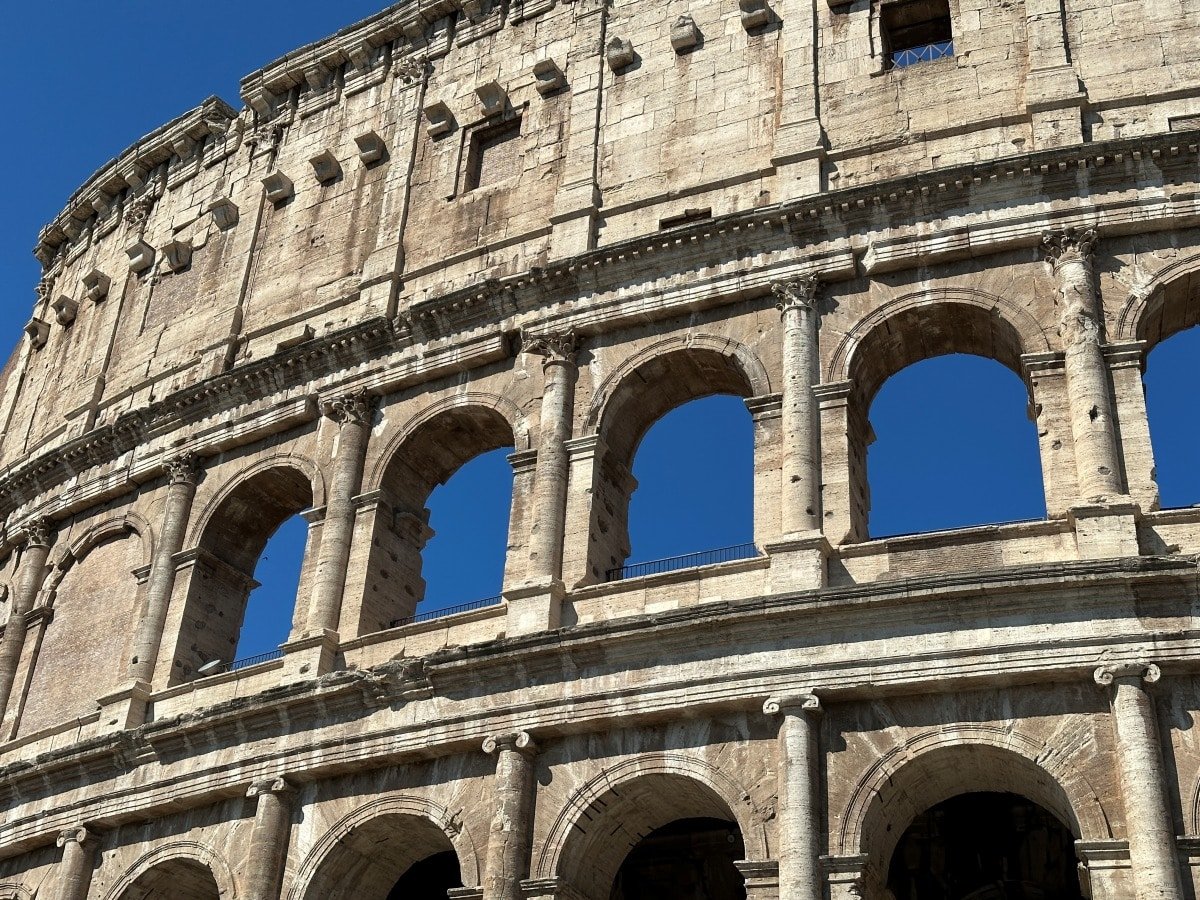 rome colosseum tourist carving