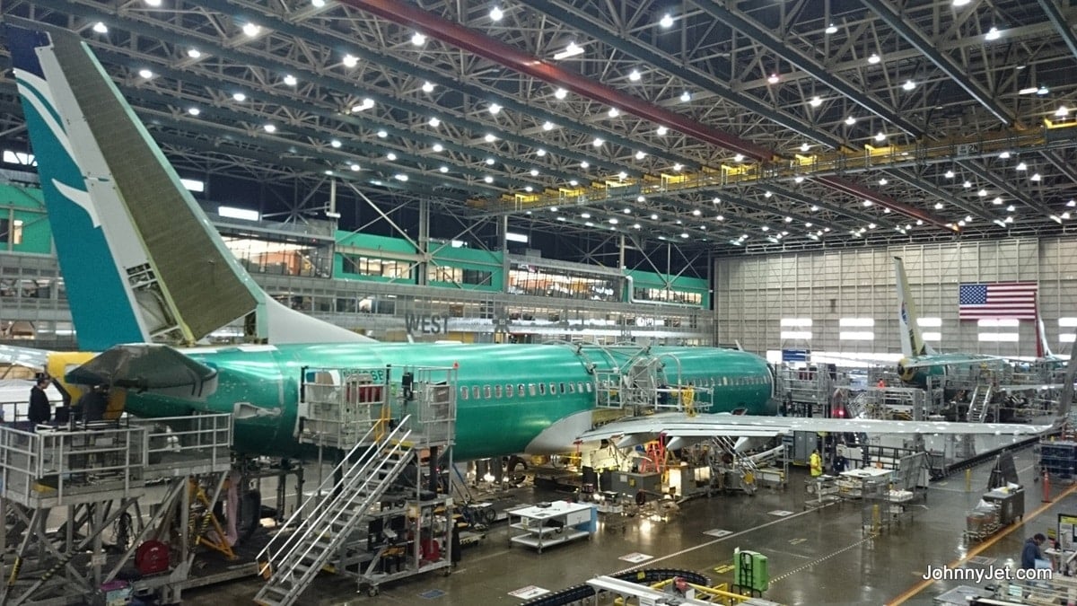 Boeing airplane in factory.