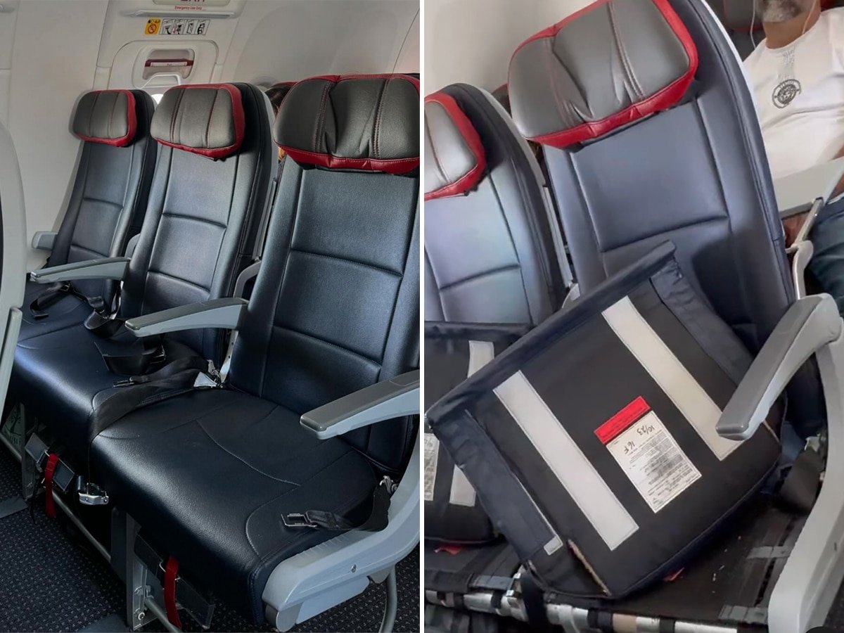 American Airlines flight attendant pulls up seat cushions in empty row so no one can sit there.