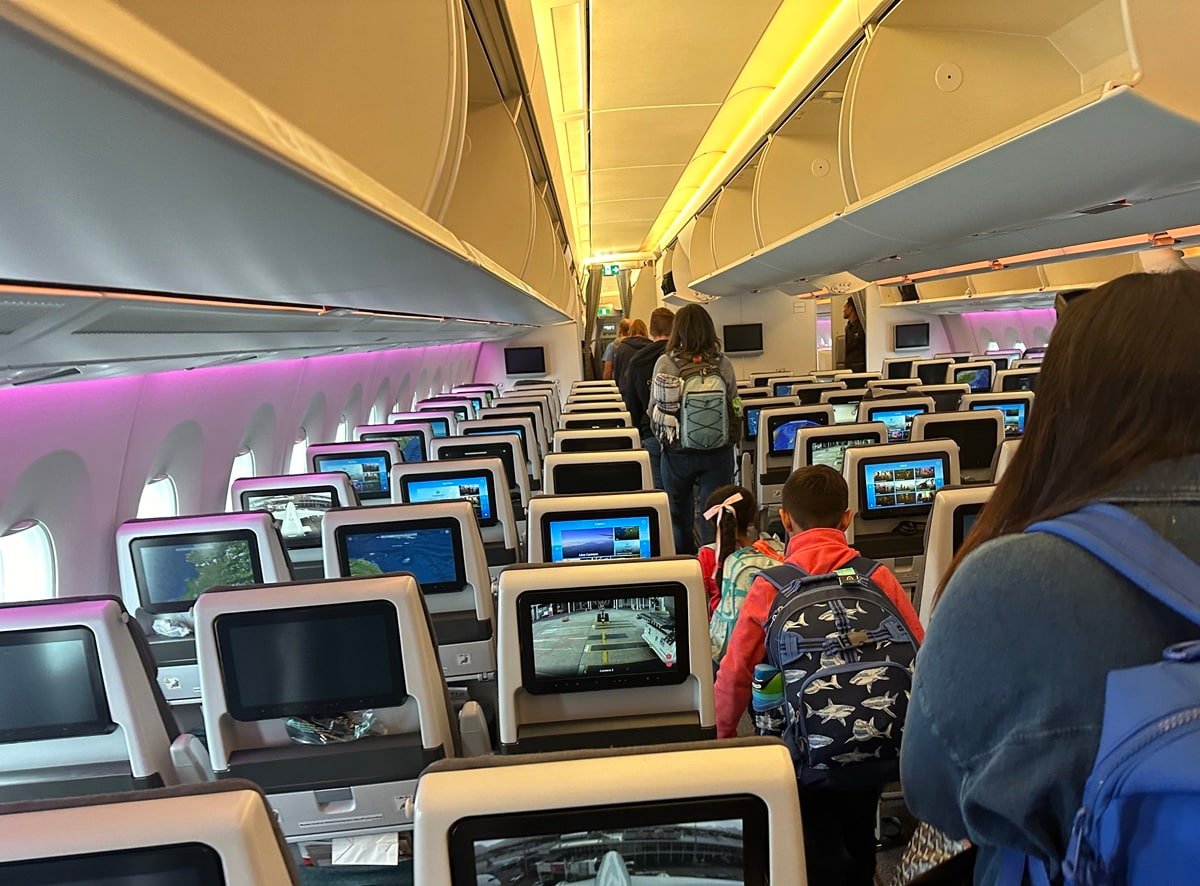 Passengers deplaning an aircraft.