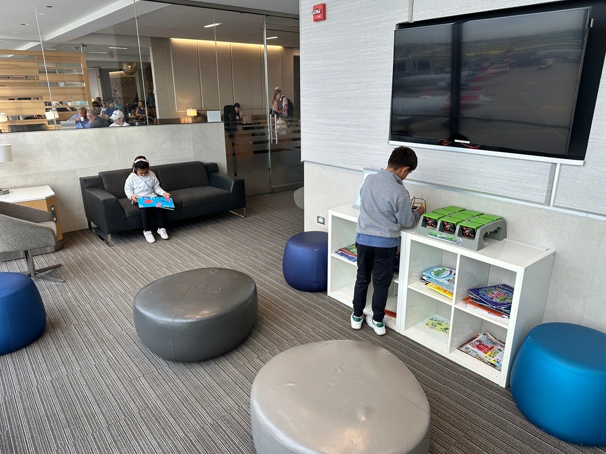 Kids in airline club lounge