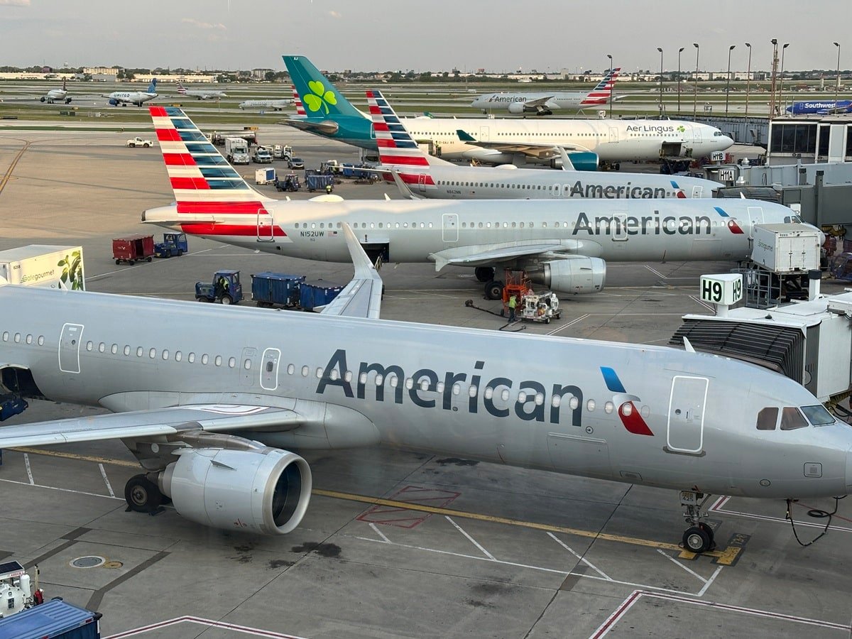 Three American Airlines planes parked at ORD